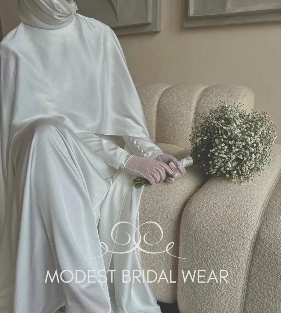 A timeless bridal look with capes and grace A timeless bridal look with capes and grace